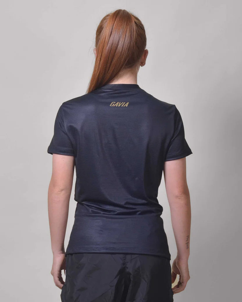 POLERA RUNNING TINIEBLA Mujer