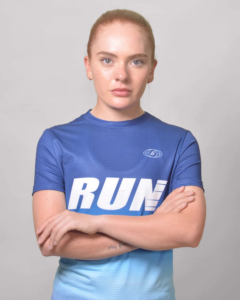 POLERA RUNNING CELESTE Mujer
