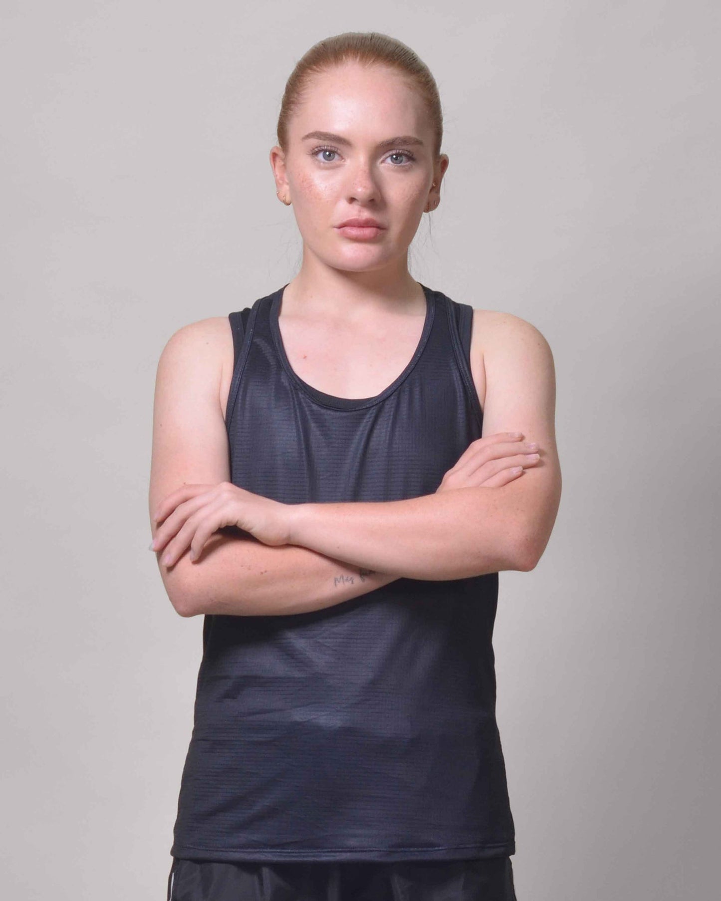 POLERA  RUNNING TINIEBLA sin mangas