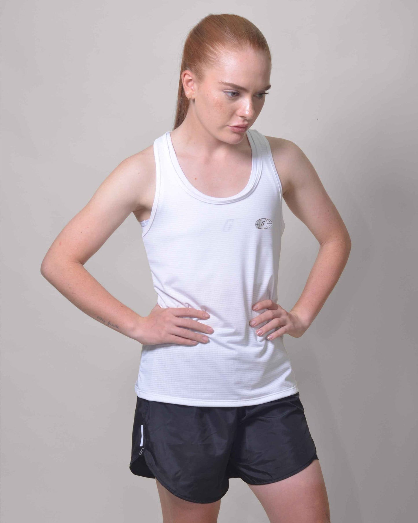 POLERA RUNNING WHITE sin mangas