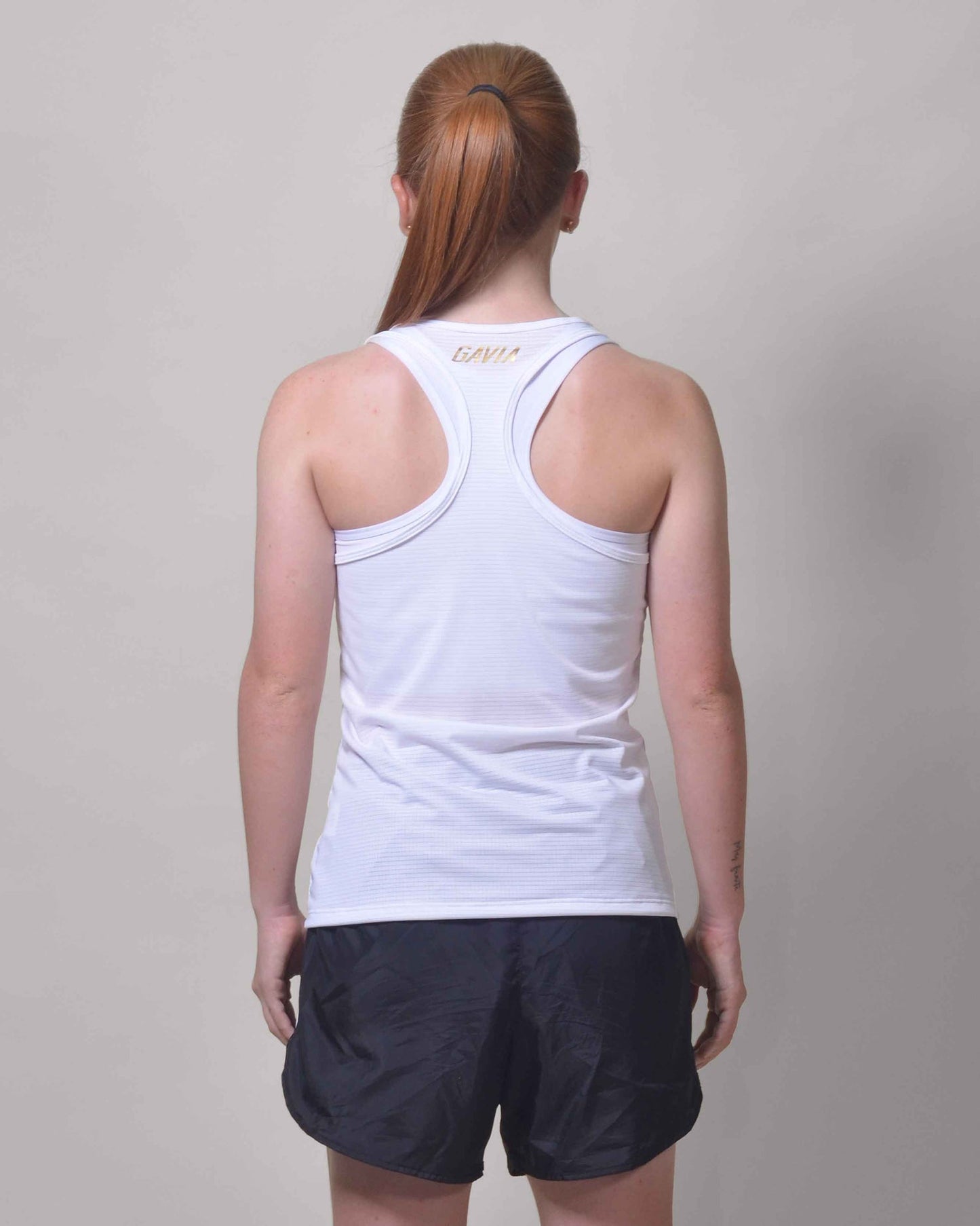 POLERA RUNNING WHITE sin mangas