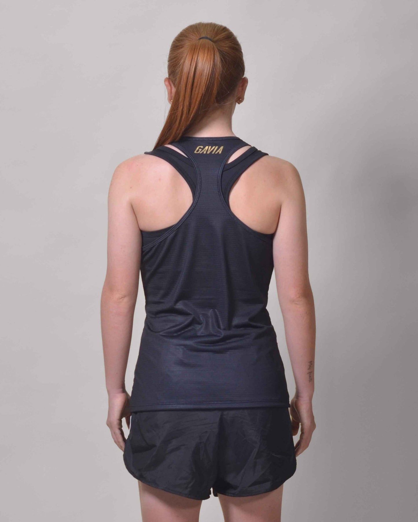 POLERA  RUNNING TINIEBLA sin mangas