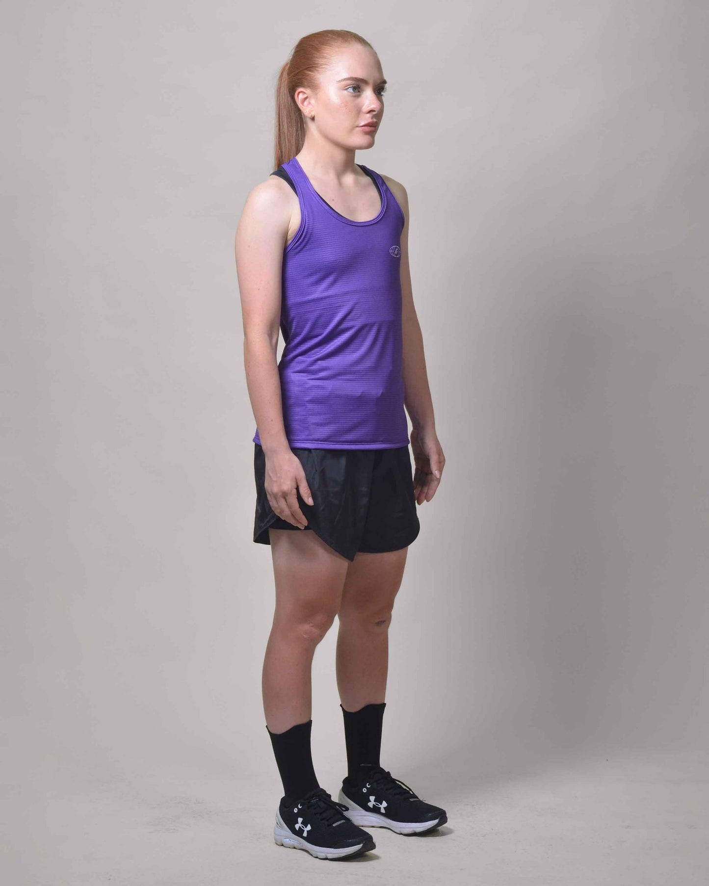 POLERA RUNNING MORA sin mangas