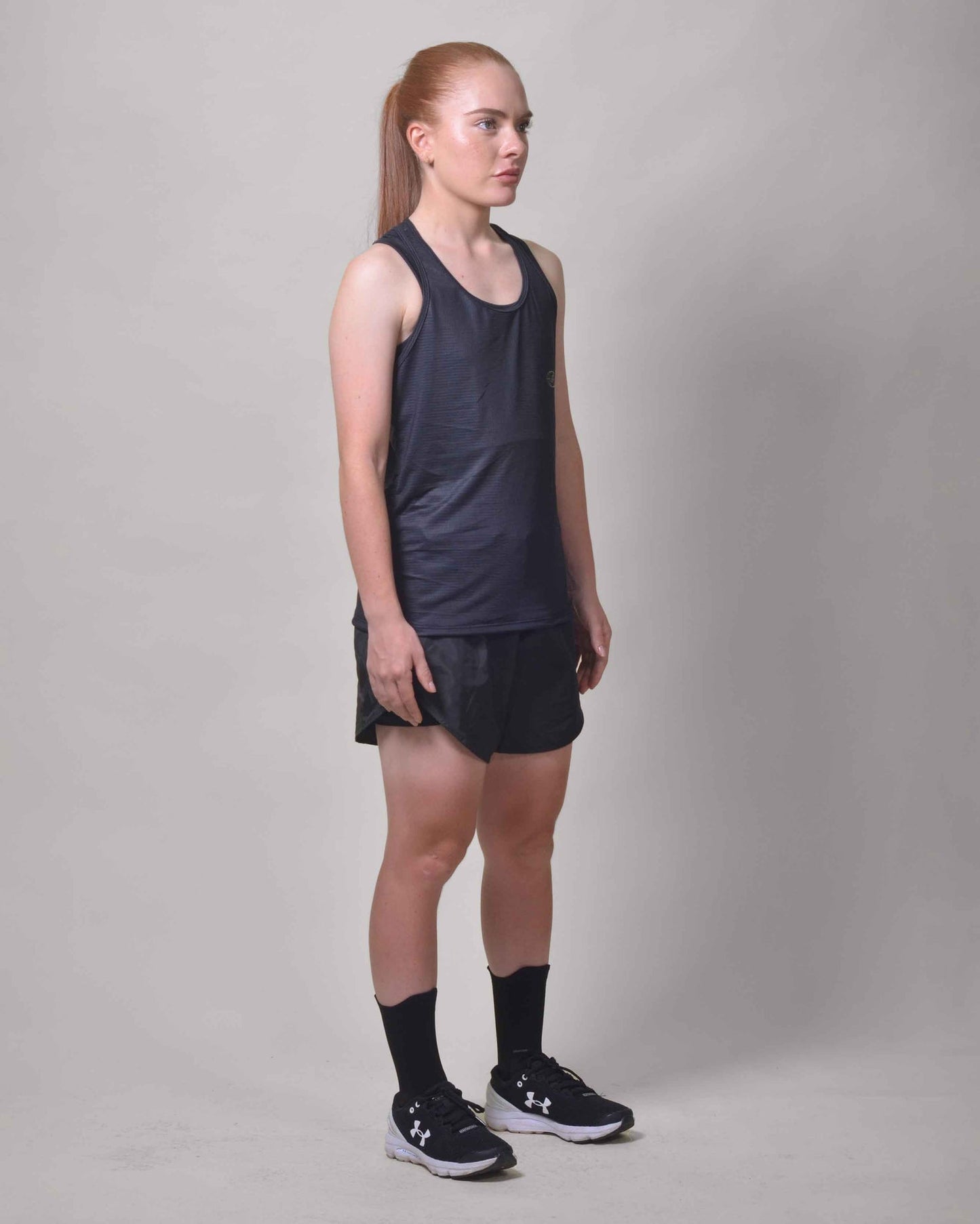 POLERA  RUNNING TINIEBLA sin mangas
