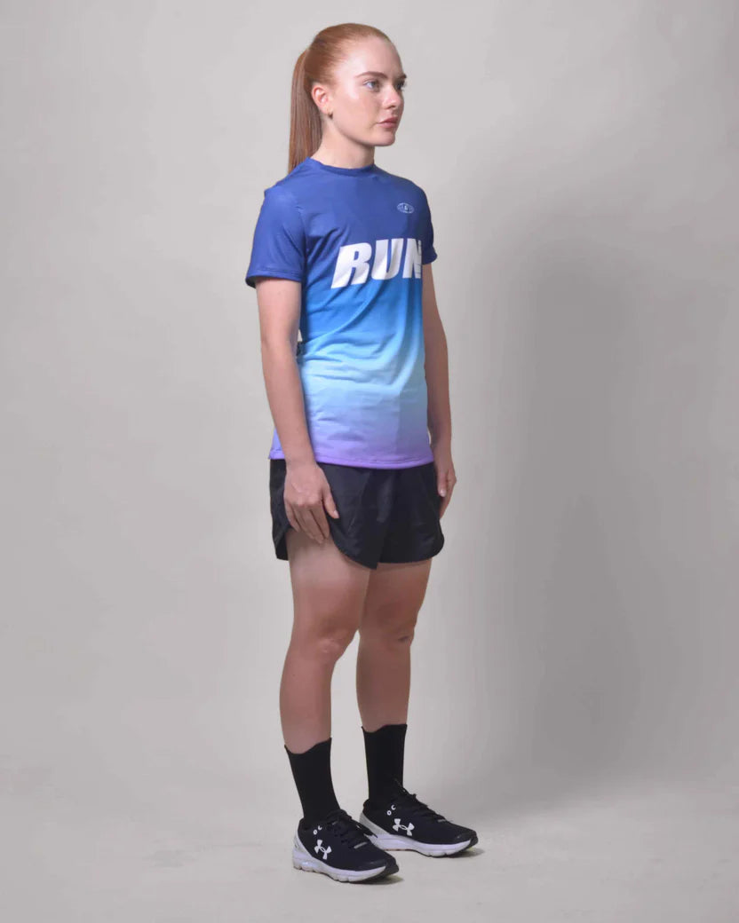 POLERA RUNNING CELESTE Mujer
