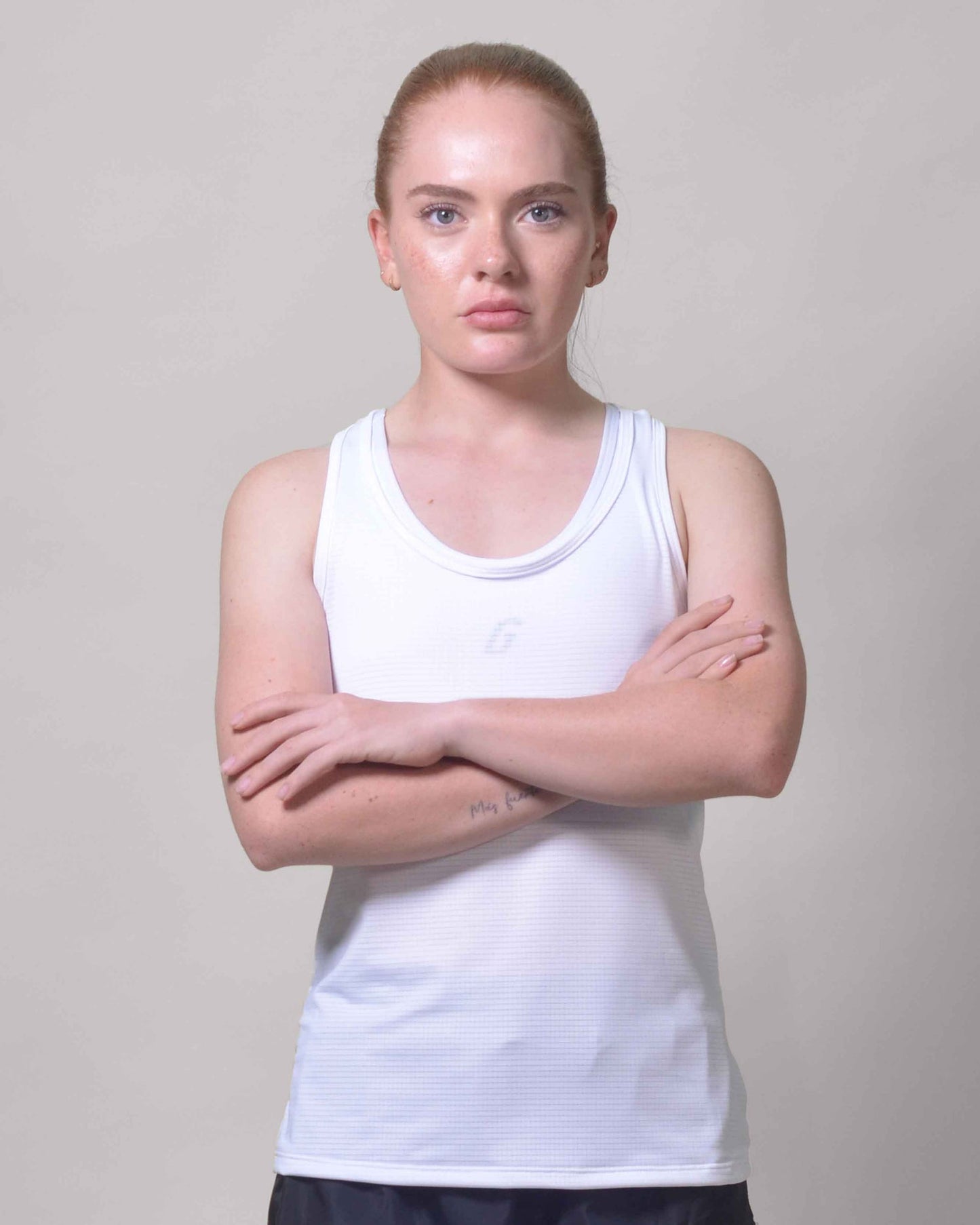POLERA RUNNING WHITE sin mangas