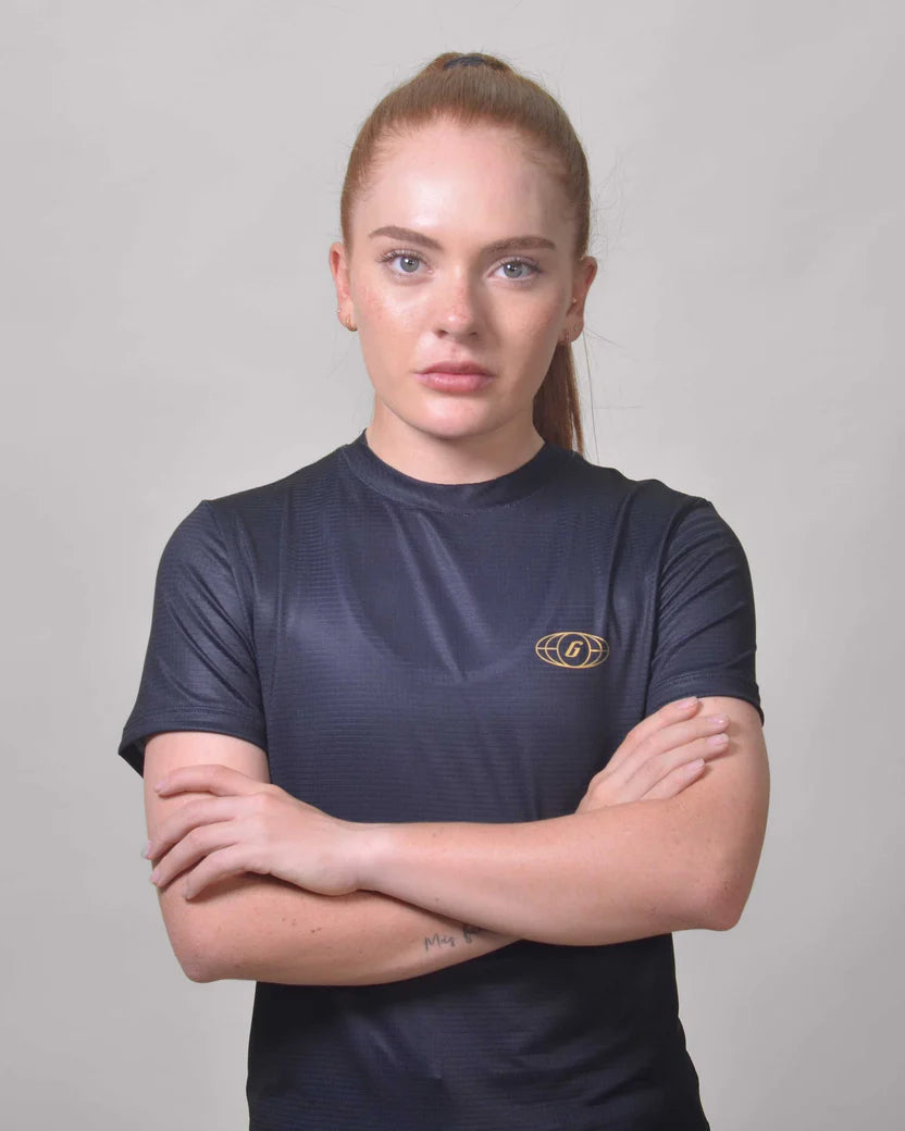 POLERA RUNNING TINIEBLA Mujer