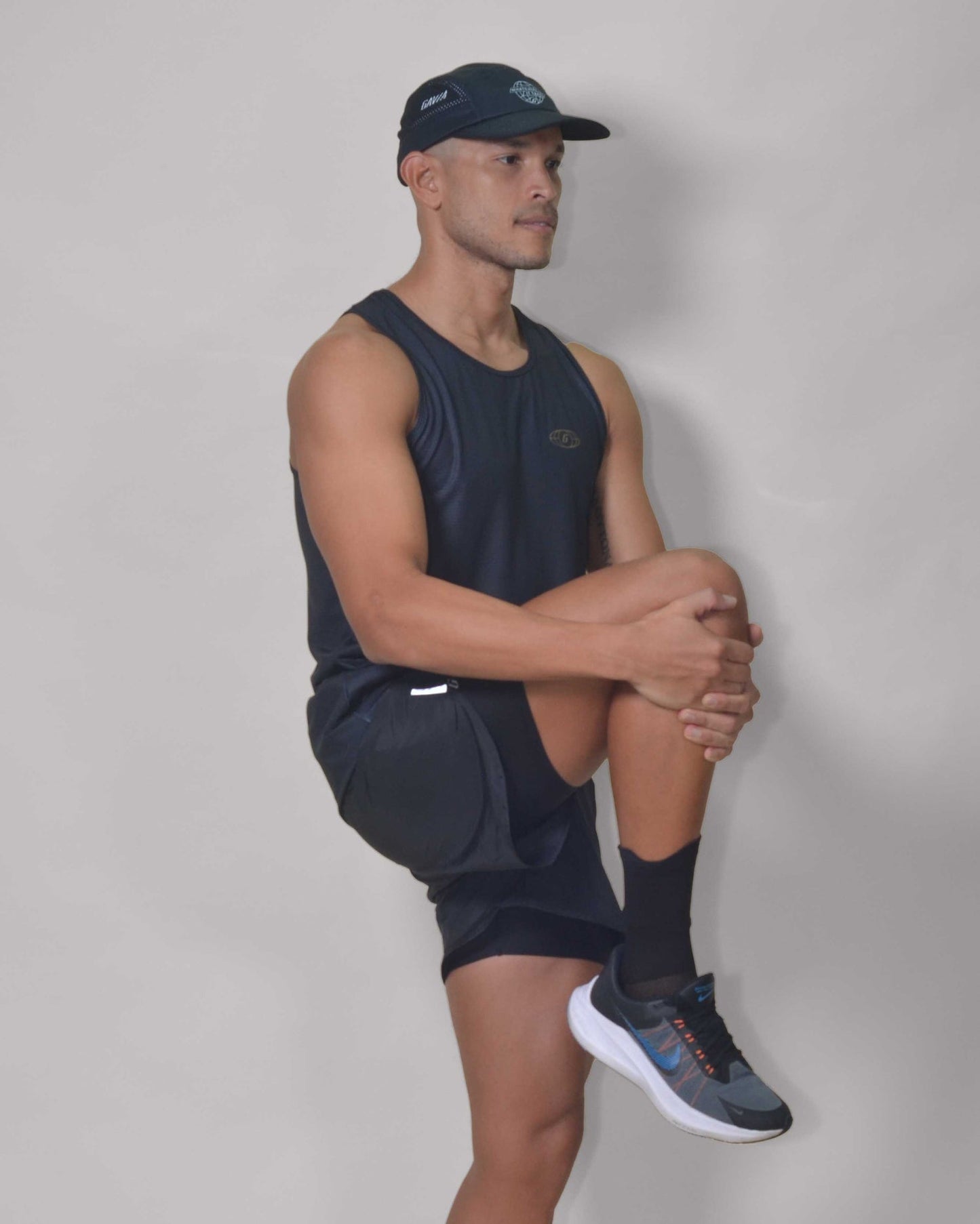 POLERA RUNNING TINIEBLA sin mangas