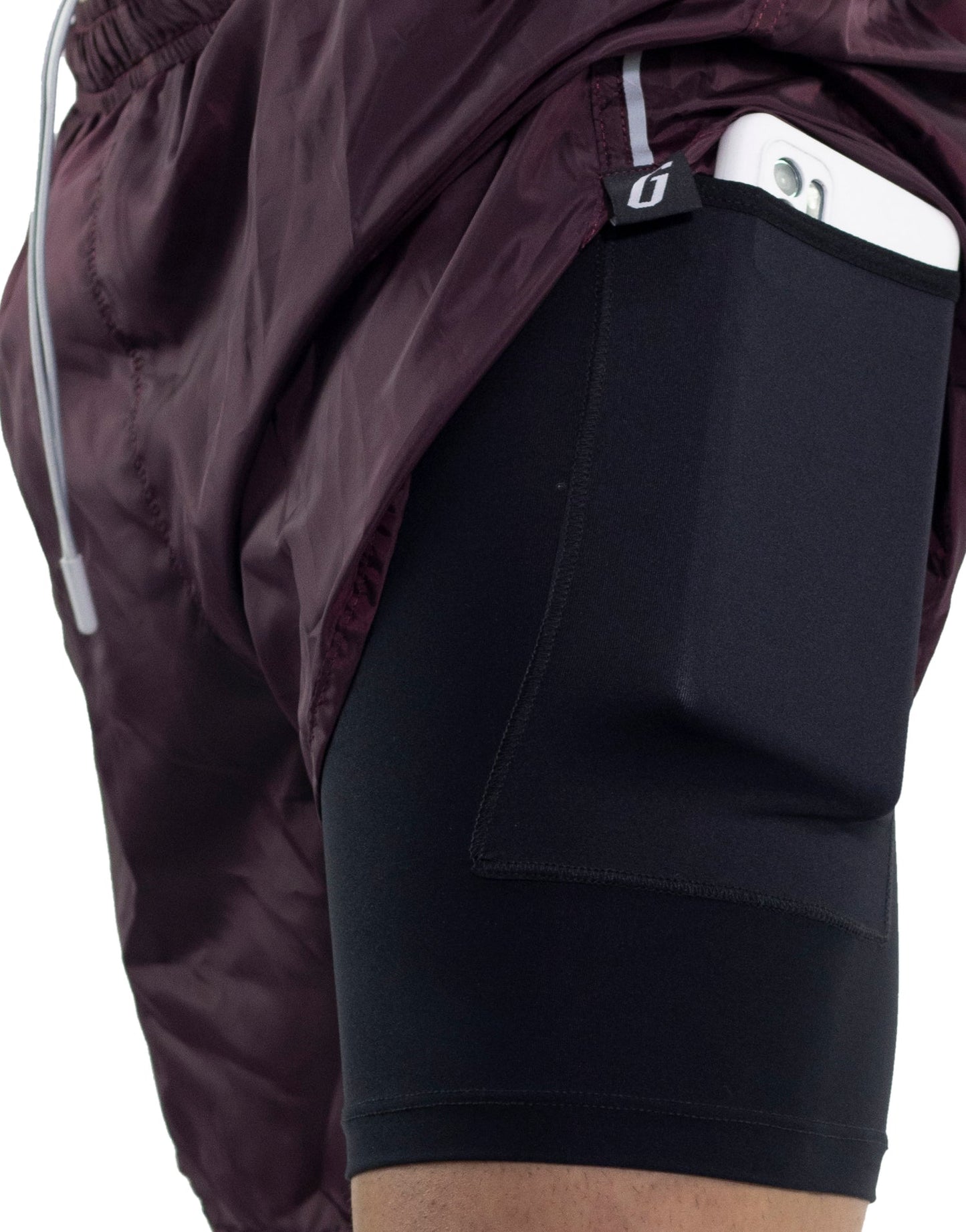 PANTALON RUNNING CON BOLSILLO VINO