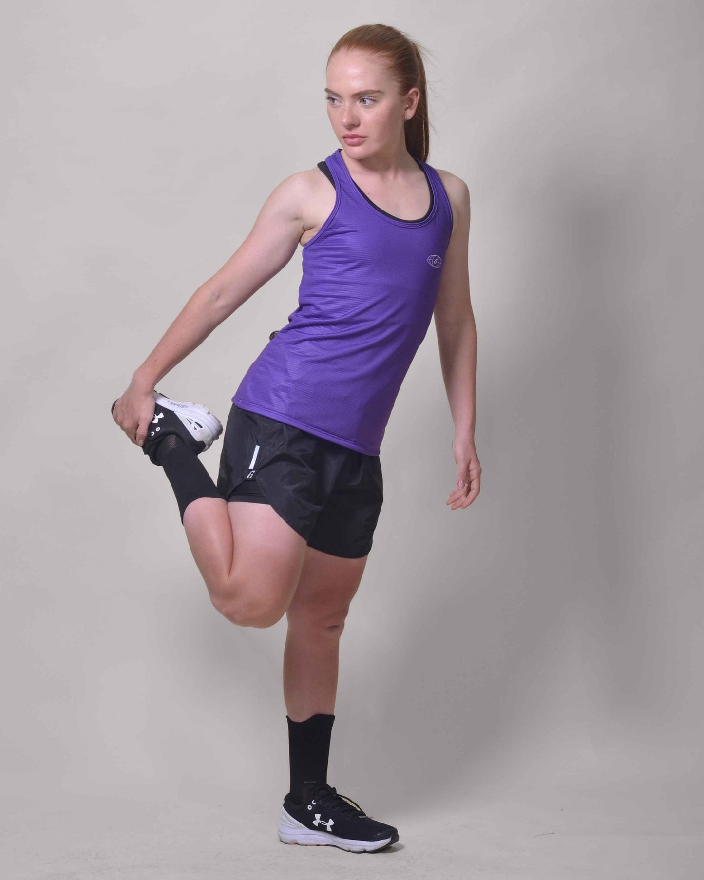 POLERA RUNNING MORA sin mangas
